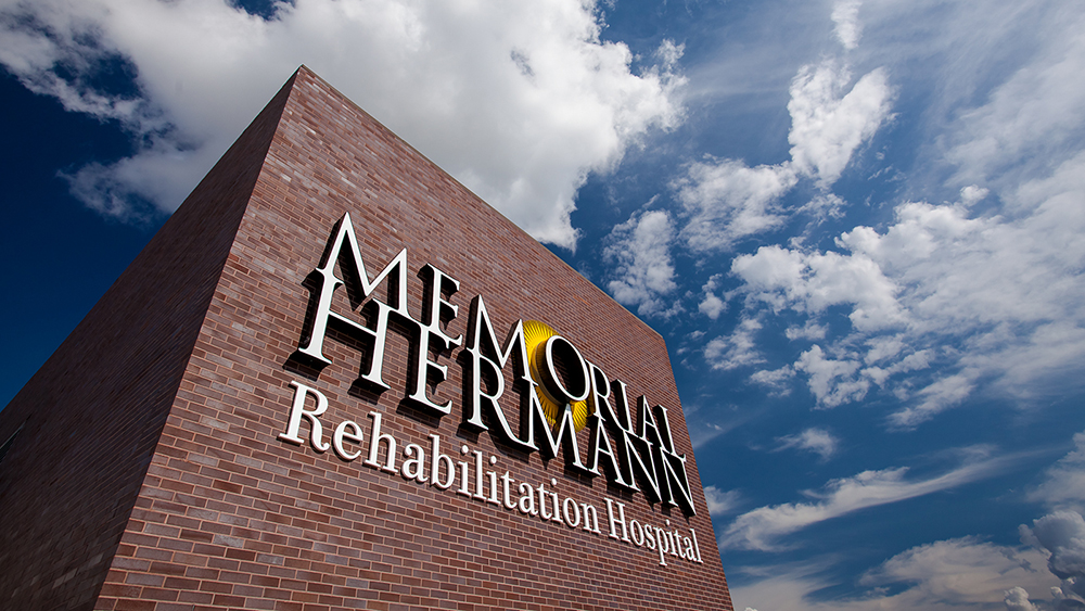 The Rehabilitation Hospital - Katy logo and a blue sky