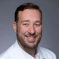 Photo of Dr. Alexander Sparkman-Royo, MD