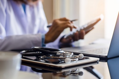 Doctor at table working