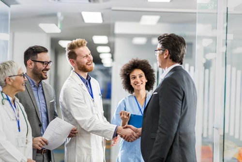 Business and Health Care shaking hands