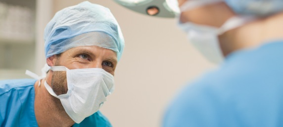 Doctors talking in the operating room