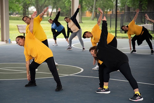 People stretching in park