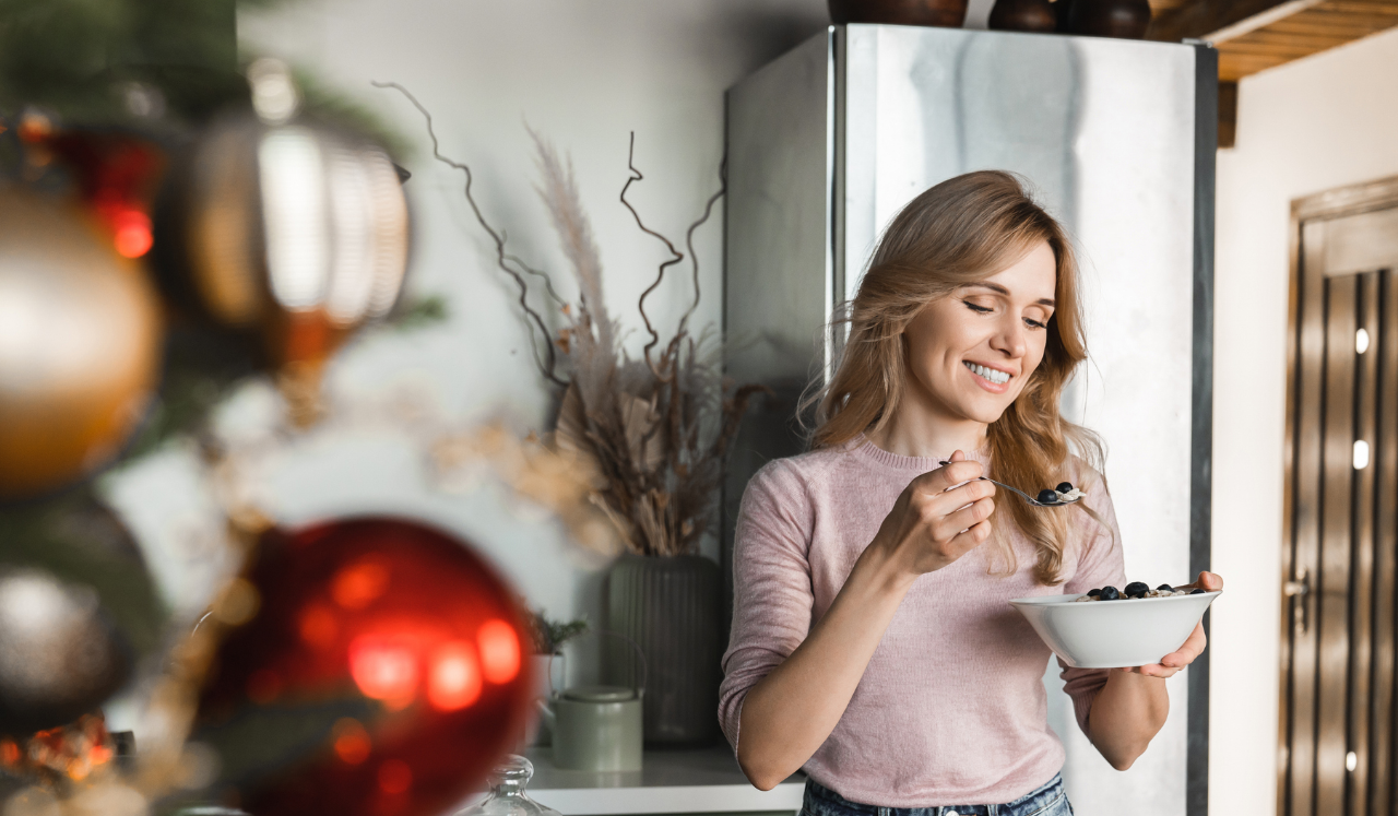Woman eating food during the holiday season