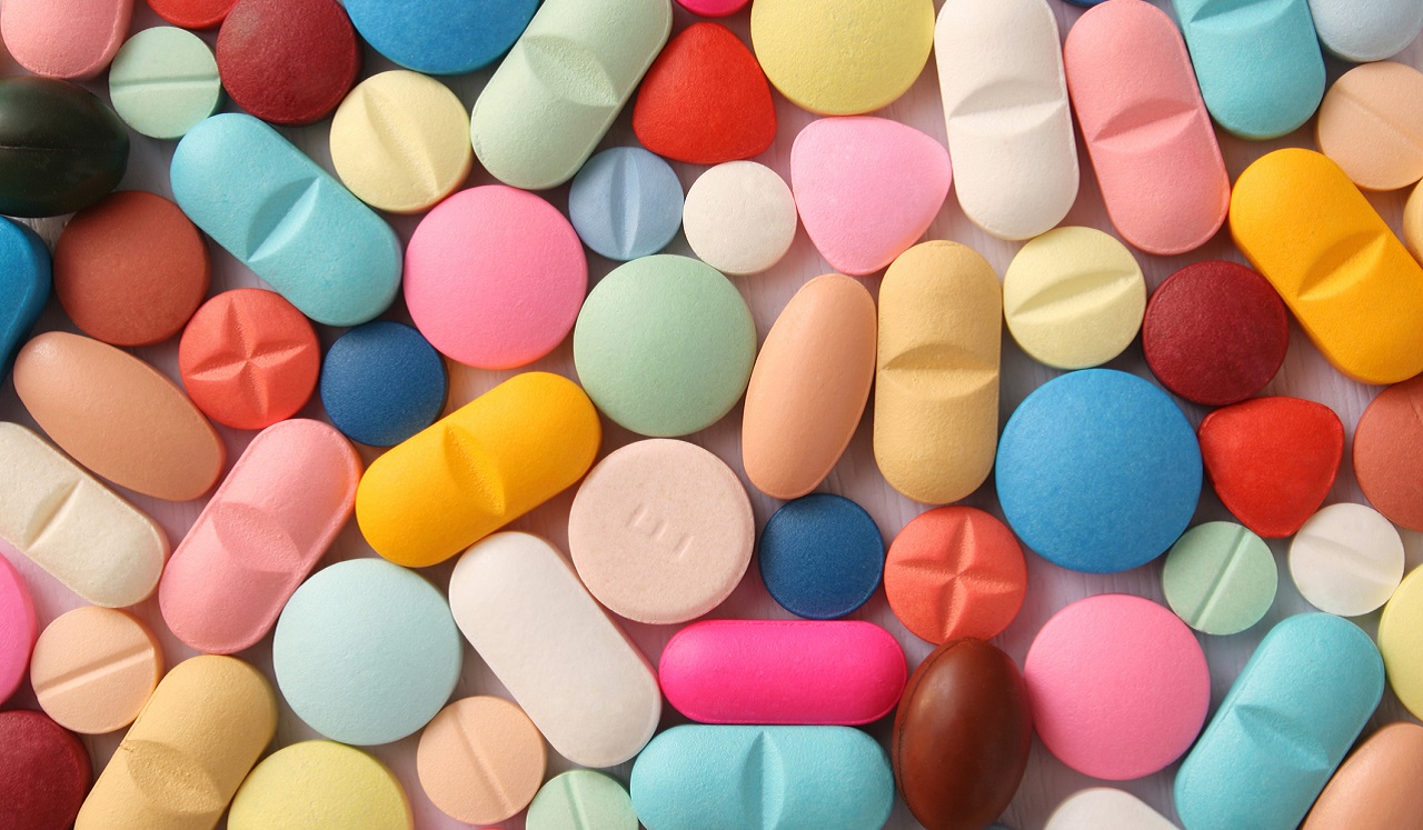 An assortment of brightly colored pills.