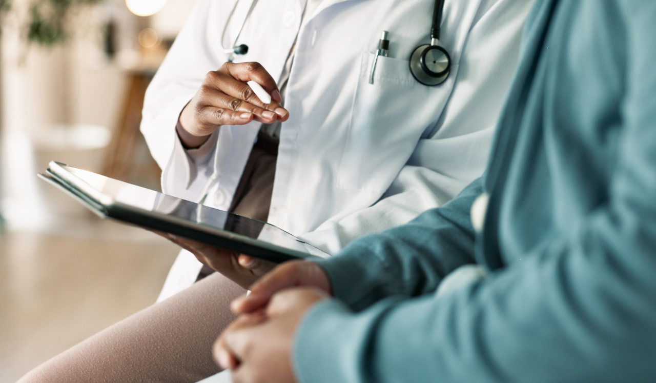Doctor talking with patient