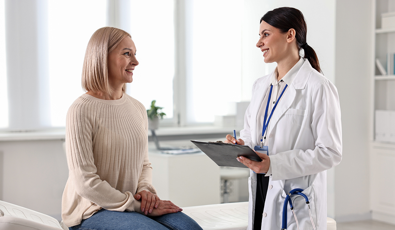 Patient talking with doctor.