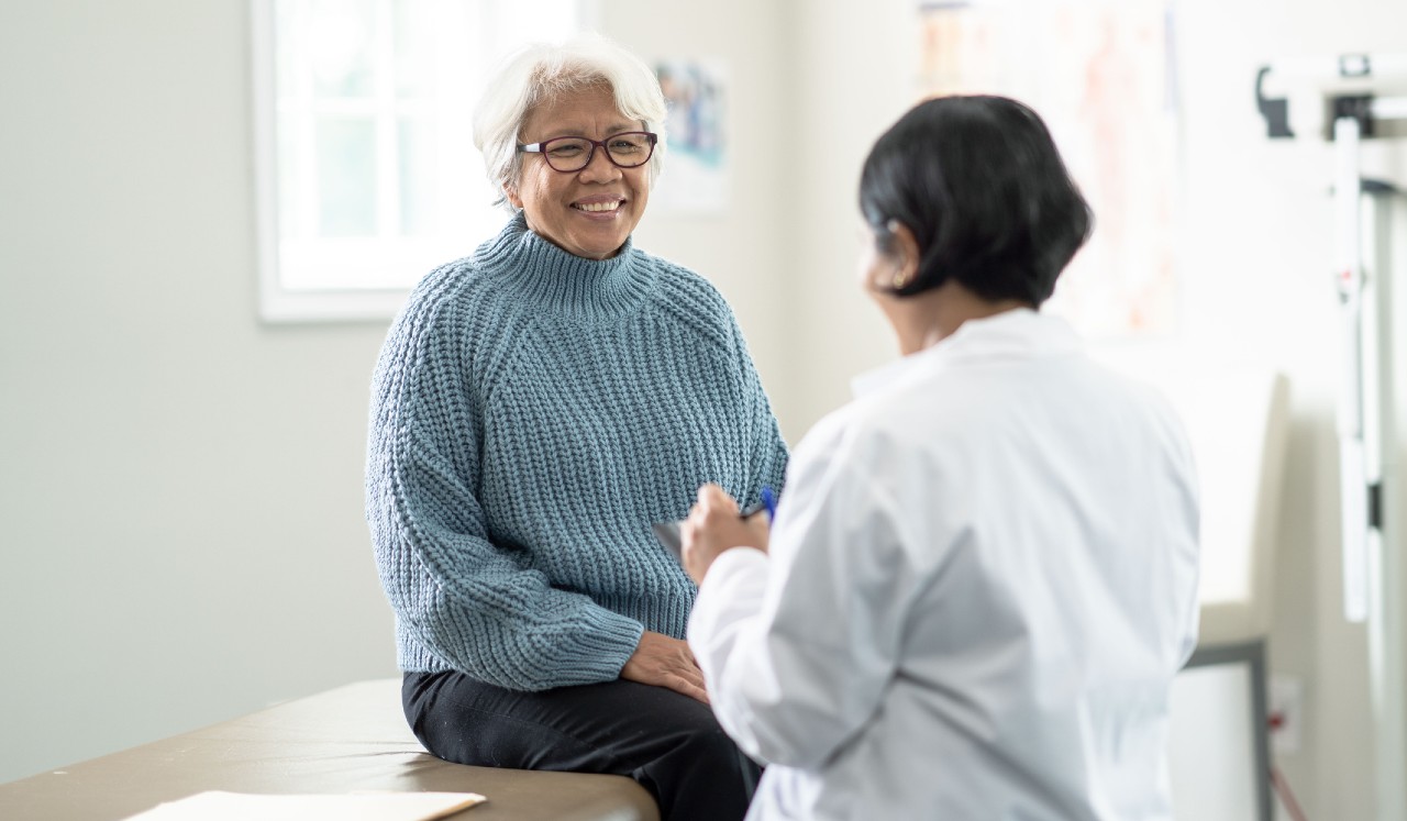 Doctor speaking with patient