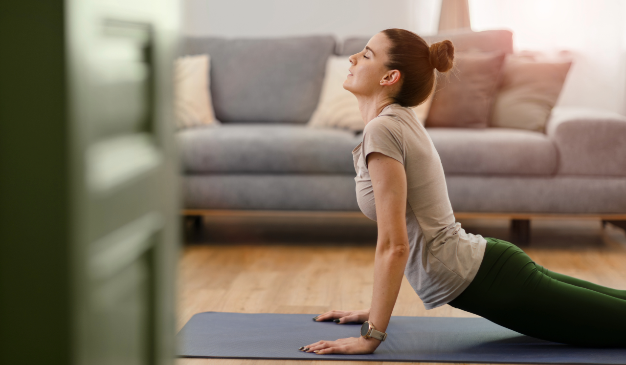Woman stretching on mat