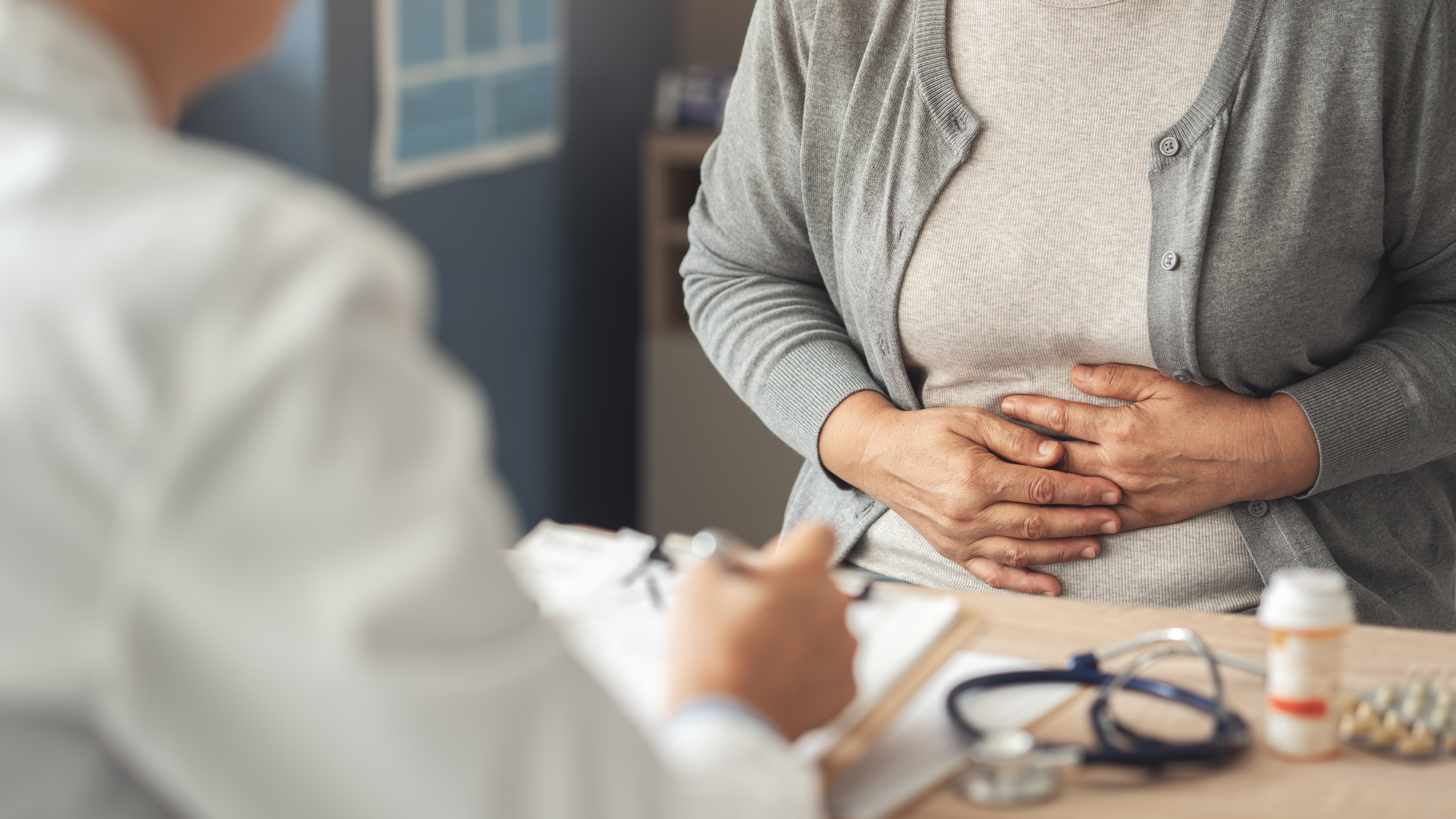 Person discussing weight issues with doctor