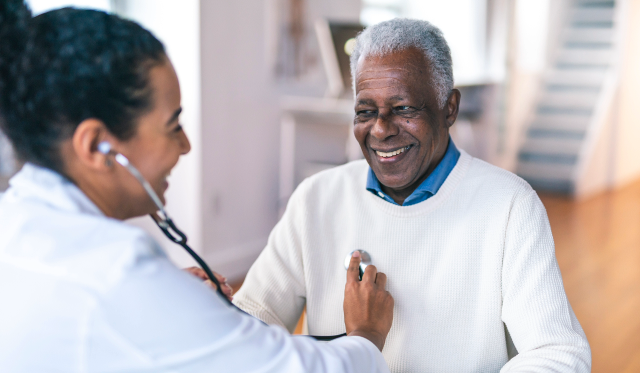 Doctor checking patients heart.