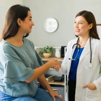 Doctor speaking with patient