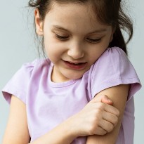 Child scratching arm