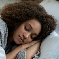 Woman sleeping in bed