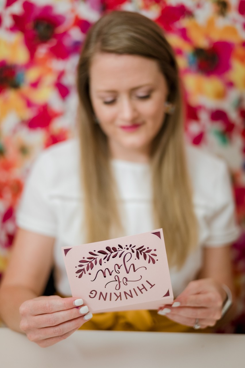 Amber holding a letter