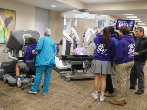 Students look at surgical robots