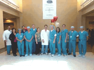 Medical professionals standing with balloons