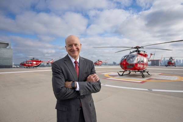 Dr. David Callender stands by Life Flight