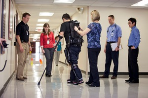 TIRR patient walking in hallway
