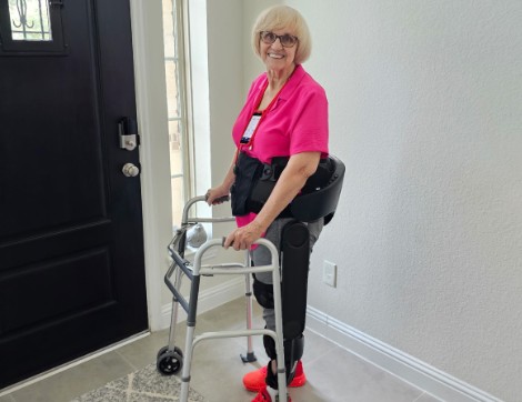 TIRR Memorial Hermann patient, Shirley Crump, shows off her exoskeleton.