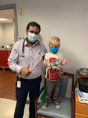 Mason Mims with his doctor