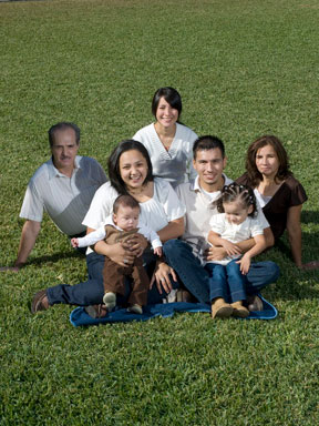 Rangel family sitting outside