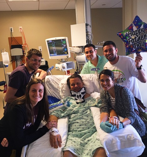 TIRR Memorial Hermann patient, Mark Neagli, is surrounded by his children while in inpatient care. 