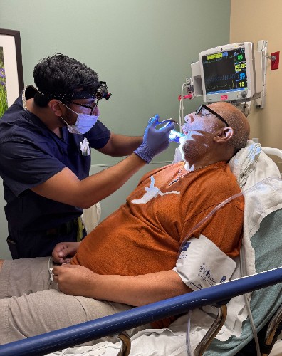 TIRR Memorial Hermann former patient, Armando Rodriguez, during a checkup.