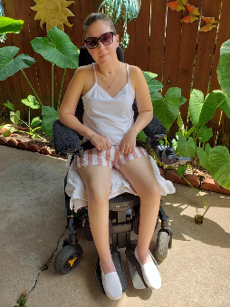 TIRR Memorial Hermann patient, Sandra Mora, lounges in the shade after recovery.