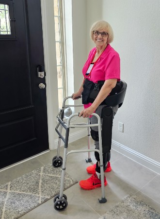 TIRR Memorial Hermann patient, Shirley Crump, shows off her exoskeleton.