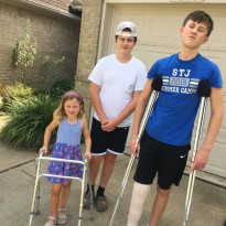 sibling patients standing together