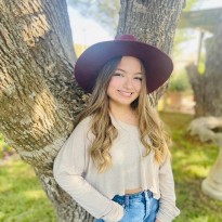patient rylee wearing hat