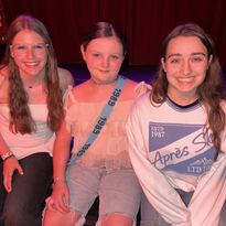 TIRR Memorial Hermann former patient, Eleanor, poses with friends post-recovery.