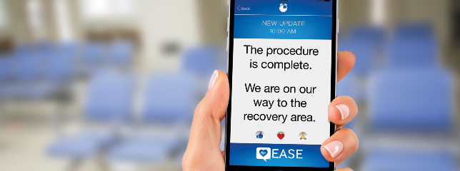 A hand holds up a phone with the EASE app providing an update on the screen.
