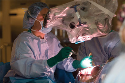 Doctor performing neurosurgery on a patient