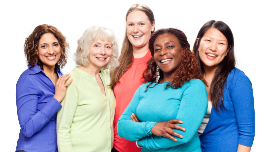 A group of women smile together in a semi-circle.