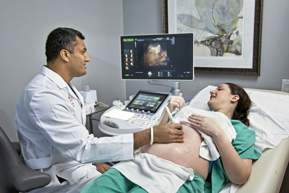 Doctor performing ultrasound