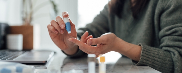person taking blood sugar