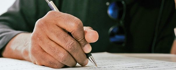 Person Writing Notes