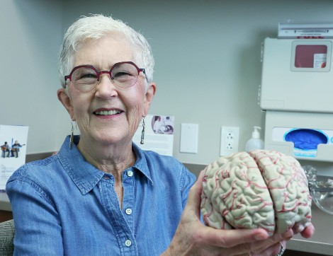patient holding brain