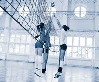 Women playing volleyball