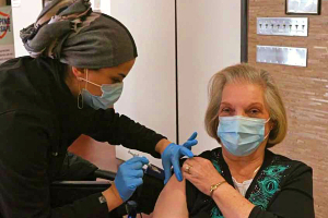 A post-polio patient receives COVID-19 vaccination provided by TIRR Memorial Hermann.