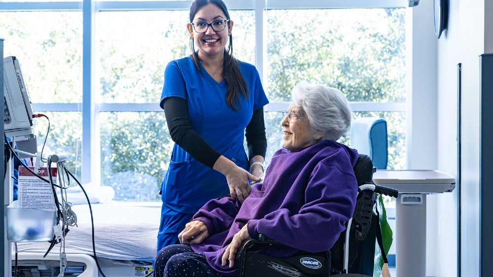 Memorial Hermann Rehabilitation Hospital-Katy nurse takes patient's blood pressure