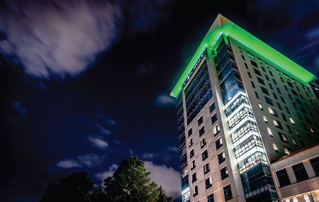 Memorial Hermann tower glows green