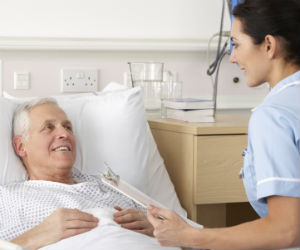 Older patient talking with doctor