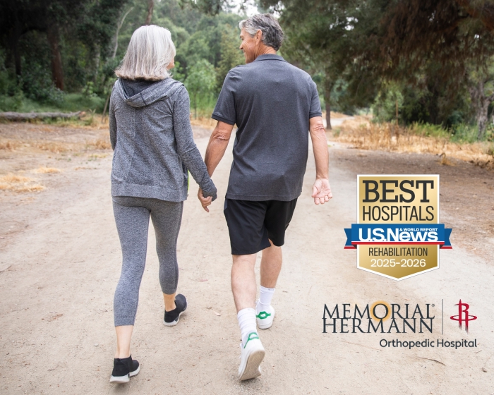 Couple walking along trail