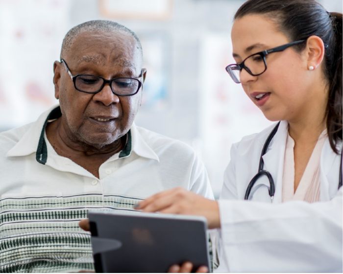 doctor talking to patient
