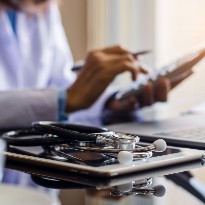 Doctor at table working