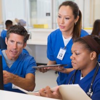 Nurses at station working