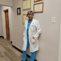 Dr Oliver in scrubs