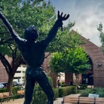 A statue stands proudly at the entrance to TIRR Memorial Hermann.
